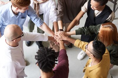 Team members celebrating together after a product launch